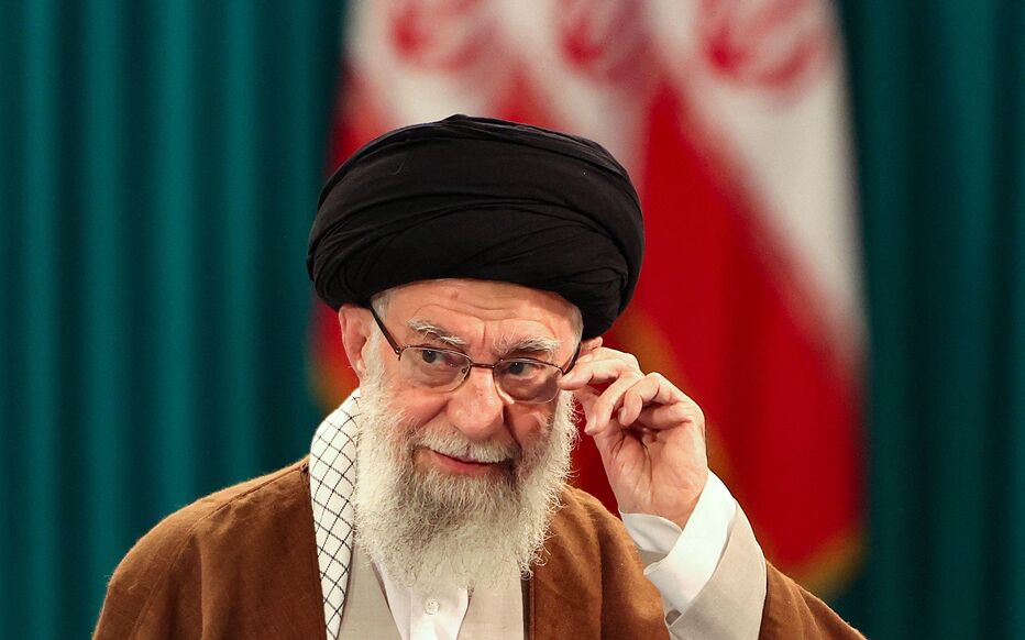 (FILES) Iran's Supreme Leader Ayatollah Ali Khamenei adjusts his eyeglasses during a press conference after casting his ballot for the parliamentary runoff elections in Tehran on May 10, 2024. US President Donald Trump announced on February 28, 2026, that Iran's supreme leader Ali Khamenei is confirmed dead. The United States and Israel launched strikes against Iran on February 28, with Israel's public broadcaster reporting that the Iranian supreme leader had been targeted, as the Islamic republic retaliated with barrages of missiles at Gulf states and Israel. (Photo by ATTA KENARE / AFP)